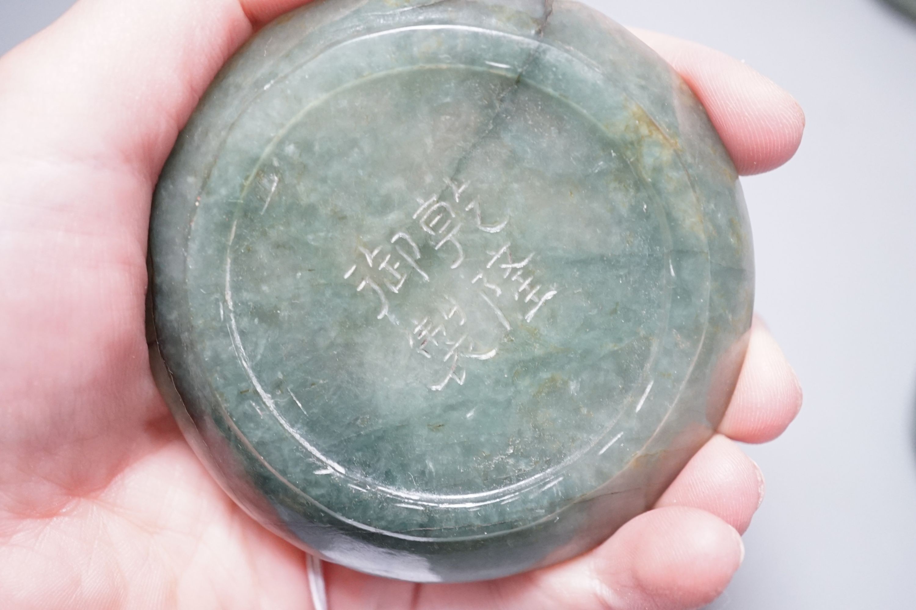 A set of six Chinese moss agate tea bowls and six saucers, engraved Qianlong mark, 19th century, saucers 8cm diameter